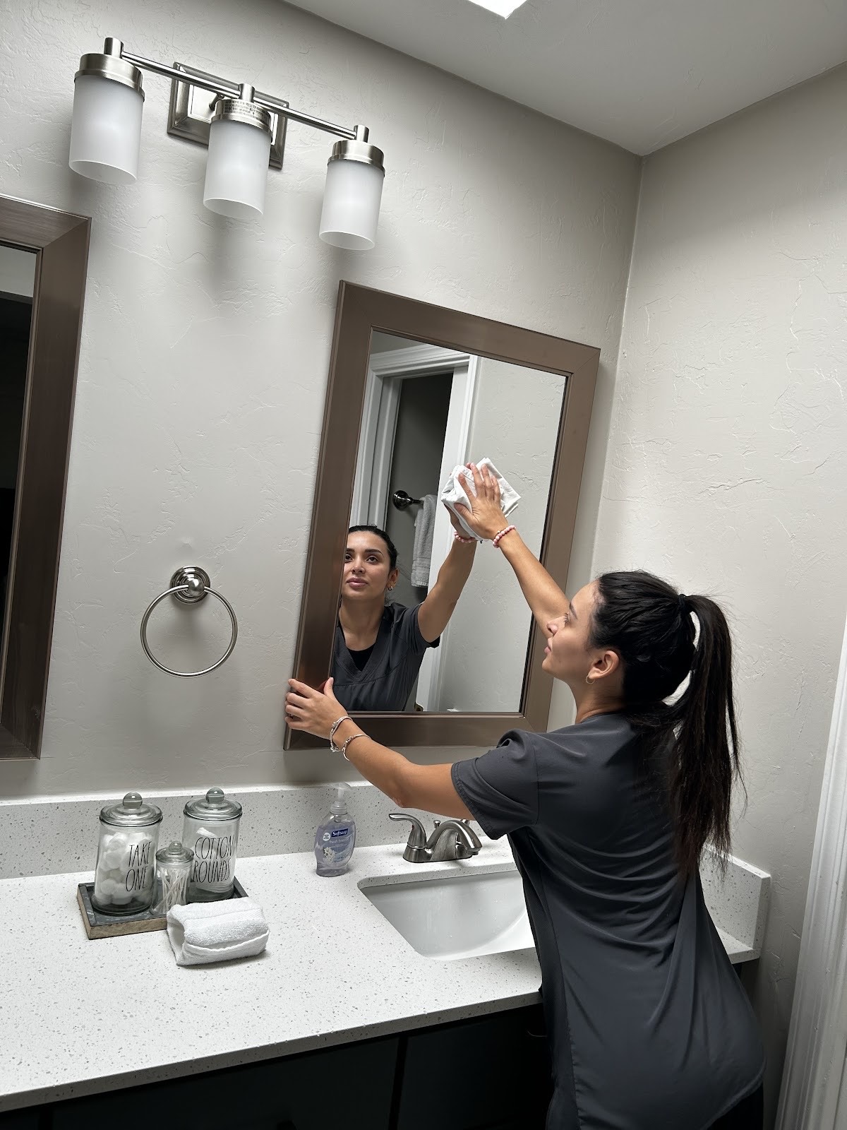 Premier House Cleaning Services Katy cleaner at work in a Katy home